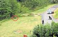 Armed Police surveilling the suspected location of Moat's campsite, in a cow field. This operation is technically known as a "steak-out"