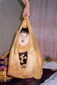 Ancient traditional Chinese method of transportation. Actually, the baby in the plastic bag is actually a picture taken in Good korea