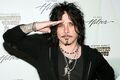 Corabi tries to be like Nikki Sixx.